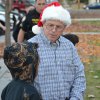 Lemoore Councilmember Dave Brown chats with a local youngster at Reason for the Season.